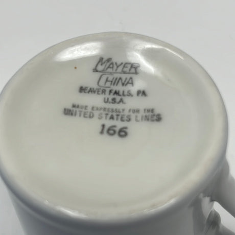 Vintage ceramic espresso cups with black text, reminiscent of United States airlines. Mayer China white espresso cups for a unique coffee experience.