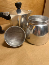 La Cafetière Venice Aluminium 6-cup espresso maker, showing bottom chamber, filter basket, and upper collecting chamber, highlighting its classic design and premium aluminium build.