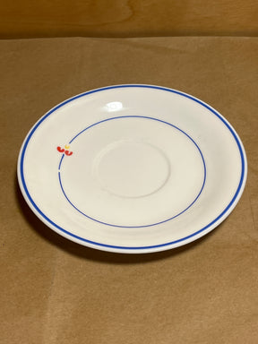 Rival Designs Tulip dinnerware collection Lot 3078 features a white ceramic saucer with blue rings and a red motif, ideal for enhancing any table setting.