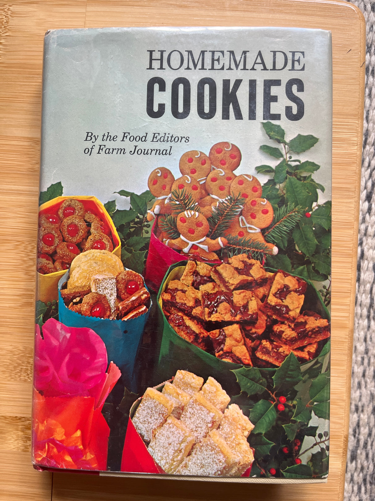 Homemade Cookies by the Food Editors of Farm Journal on a table, showcasing a cookbook with over 460 cookie recipes, including classic and unique options.