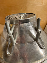 Louis Teller 3.5qt rotary food mill potato ricer disassembled, showing a flared metal reflector, ceramic insulator posts, and a vented metal insert for wiring.