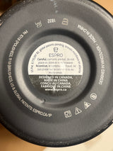 Close-up of Espro travel coffee brewer base showing logo, safety warnings, patent details, and origin markings, emphasizing its design and manufacturing information.