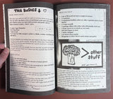 Cook Your Own Fucking Life booklet pages showing vegan recipes: Basic White Sauce, Basic Seitan, and Broccoli Soup, alongside playful broccoli sketch and product details.