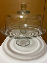 Anchor Hocking Annapolis glass 2-piece set functions as a domed cake stand and punch bowl, featuring sturdy, thick glass ideal for entertaining.