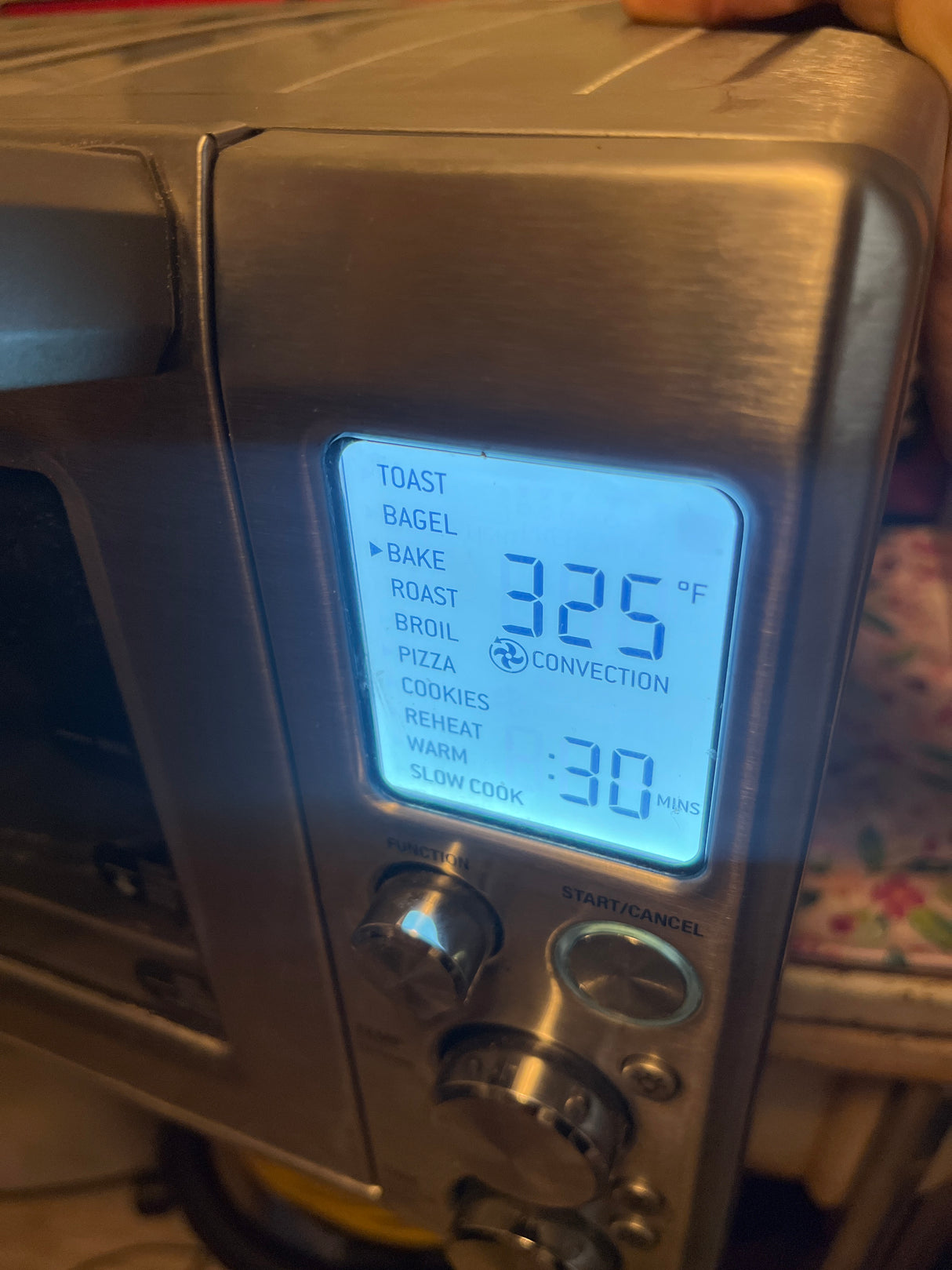 Breville oven close-up showing a digital display and control panel, highlighting the electronic features of this home appliance.