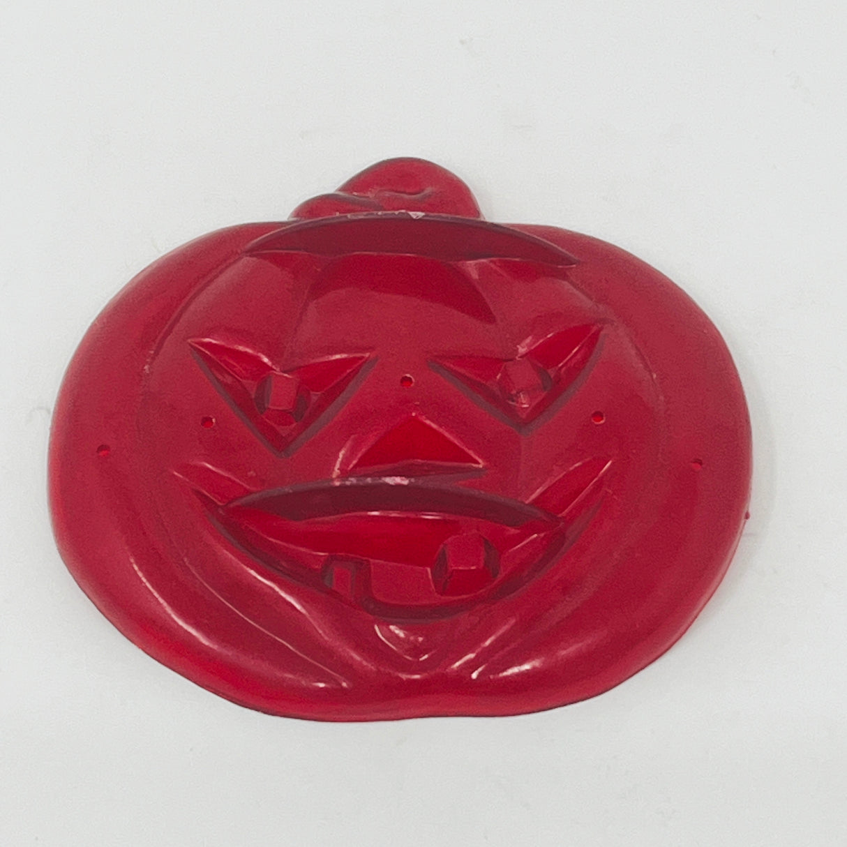 Vintage Red Plastic Cookie Cutters, some with Crown logo, mid century style pumpkin face design.