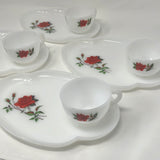 Four white teacups and saucers by Federal Glass Co., featuring red rose designs. Excellent condition in original box.