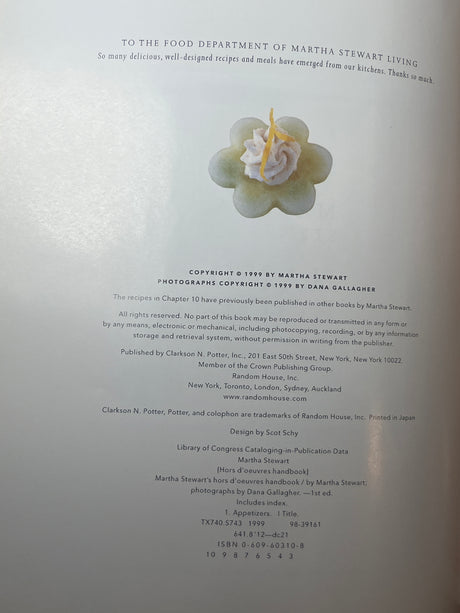 Dedication page from Martha Stewart's Hors d'Oeuvres Handbook featuring a flower-shaped hors d'oeuvre image, with copyright and publication details below.
