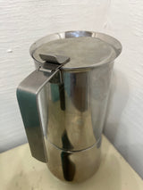 Ilsa Turbo Express 6-Cup 18/10 stainless steel stovetop espresso pot on countertop, showcasing its two-chamber design for brewing rich, full-bodied espresso.