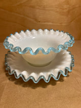 Bowl n plate set of ruffled-edge milk glass with crimped rims, featuring a small serving bowl and matching underplate, highlighted by translucent trim.