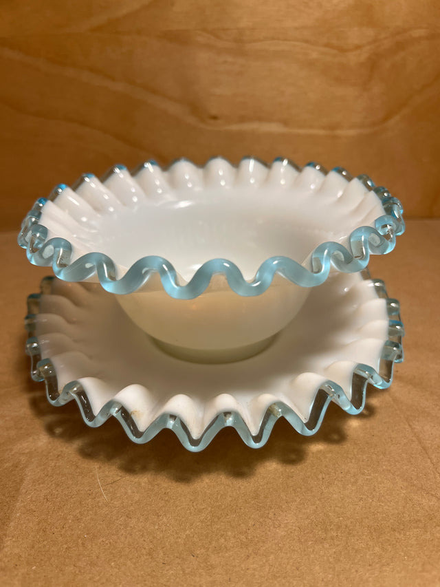 Bowl n plate set of ruffled-edge milk glass with crimped rims, featuring a small serving bowl and matching underplate, highlighted by translucent trim.