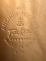 Embossed underside of a 9-inch vintage glass Fire-King Anchor Hocking 460 pie plate, featuring maker’s mark and “Made in U.S.A.” details.