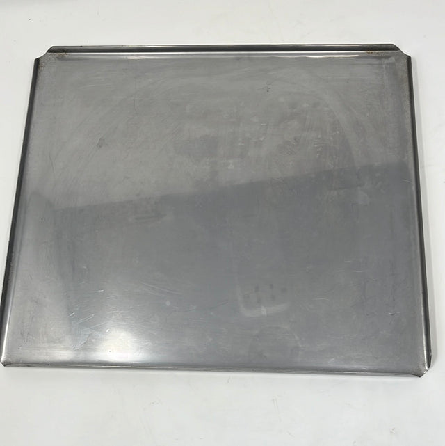 Stainless steel heavy-duty pan, ideal for baking, featuring a metal tray on a white surface. Lightweight and sturdy for oven use.