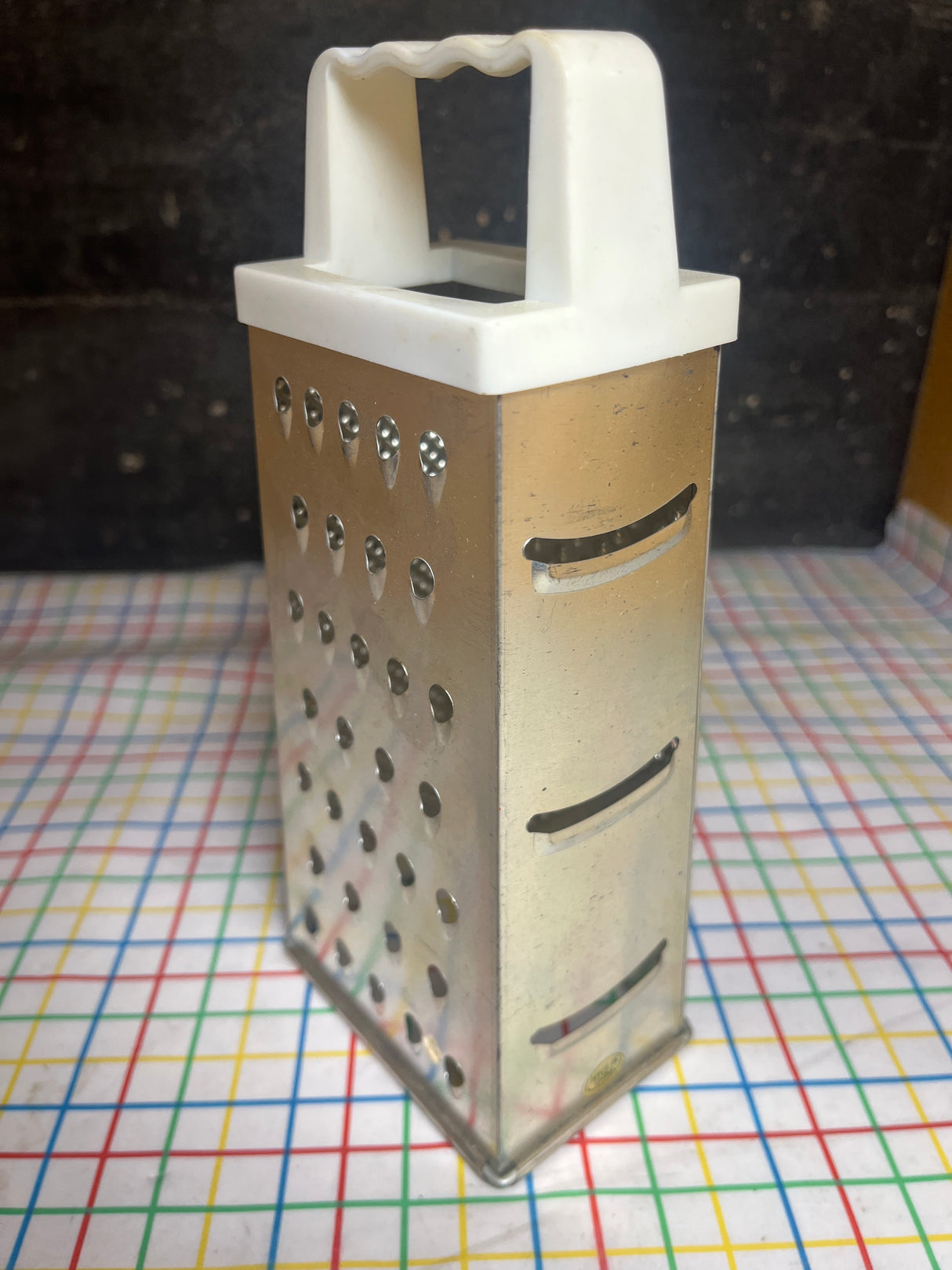 Box grater - stainless steel with white plastic handle