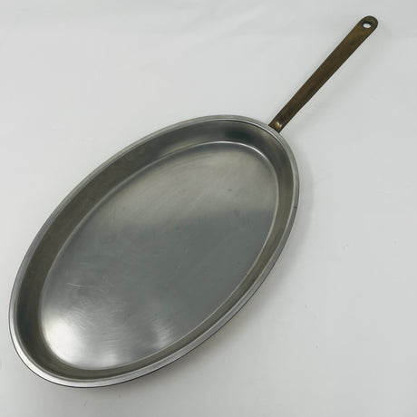 Oval copper sauté pan with brass handle by Spring Culinox Switzerland. From Spoons Kitchen Exchange.