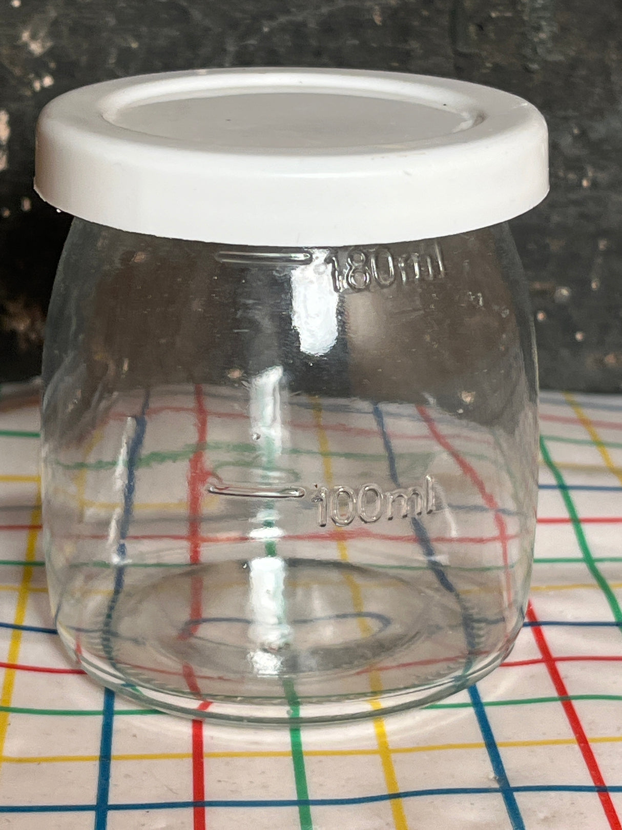Clear glass jar with white lid for yogurt making and food storage