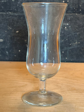 Mini hurricane drinking glass with a tulip-shaped bowl, short angled stem, and round foot, perfect for serving strong cocktails and after-dinner drinks.