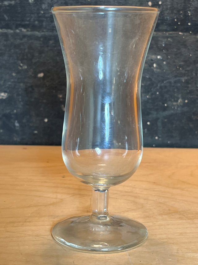 Mini hurricane drinking glass with a tulip-shaped bowl, short angled stem, and round foot, perfect for serving strong cocktails and after-dinner drinks.
