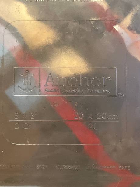 Casserole dish square 2 quart/2 liter - Anchor Hocking Basics, showing logo, dimensions, capacity, and notes on microwave and dishwasher safety.