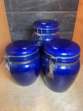Set of 3 jars - cobalt blue ceramic with locking lids, ideal for storing coffee and tea, combining functional airtight seals with stylish kitchen decor.