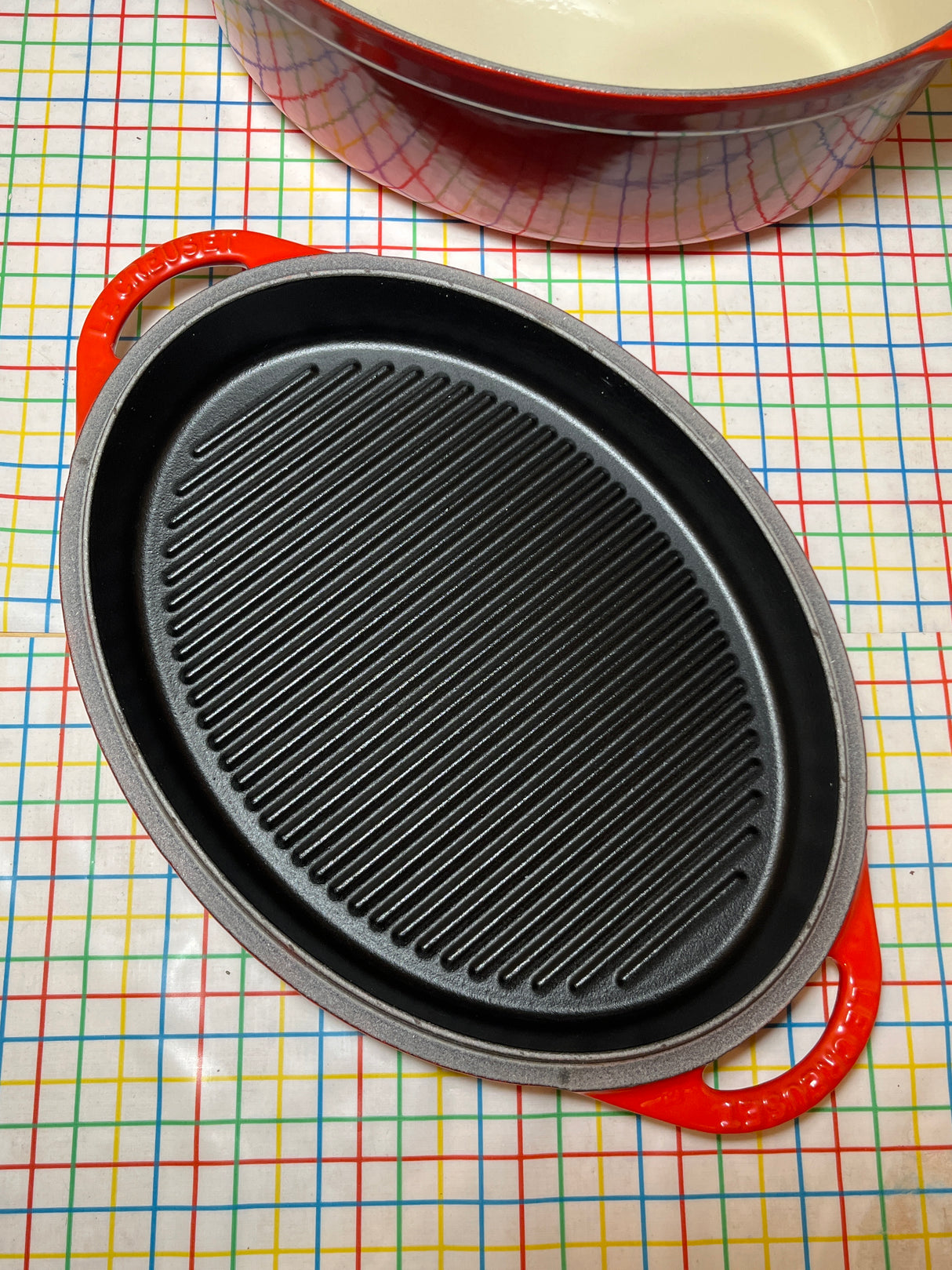Oval Dutch Oven / Bread oven with griddle lid - red enameled cast iron - Le Creuset