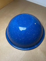 Blue speckled enamelware bowl, glossy with white flecks, turned upside-down on a countertop. Lightweight and durable, ideal for cookouts or camping.