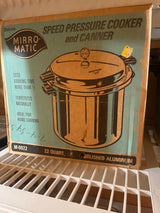 RARE Mirro-Matic 22 quart deluxe speed pressure cooker and canner, featuring original parts and a functional rubber seal, enhancing optimal canning performance.