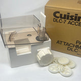 A like-new Cuisinart DLC-7 pasta attachment accessory in original packaging, featuring 7 attachments for creating various pasta shapes.