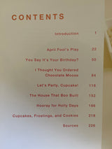 What’s New, Cupcake? cookbook cover showing red text on white, featuring creative sweet recipe ideas from the creators of Hello, Cupcake!