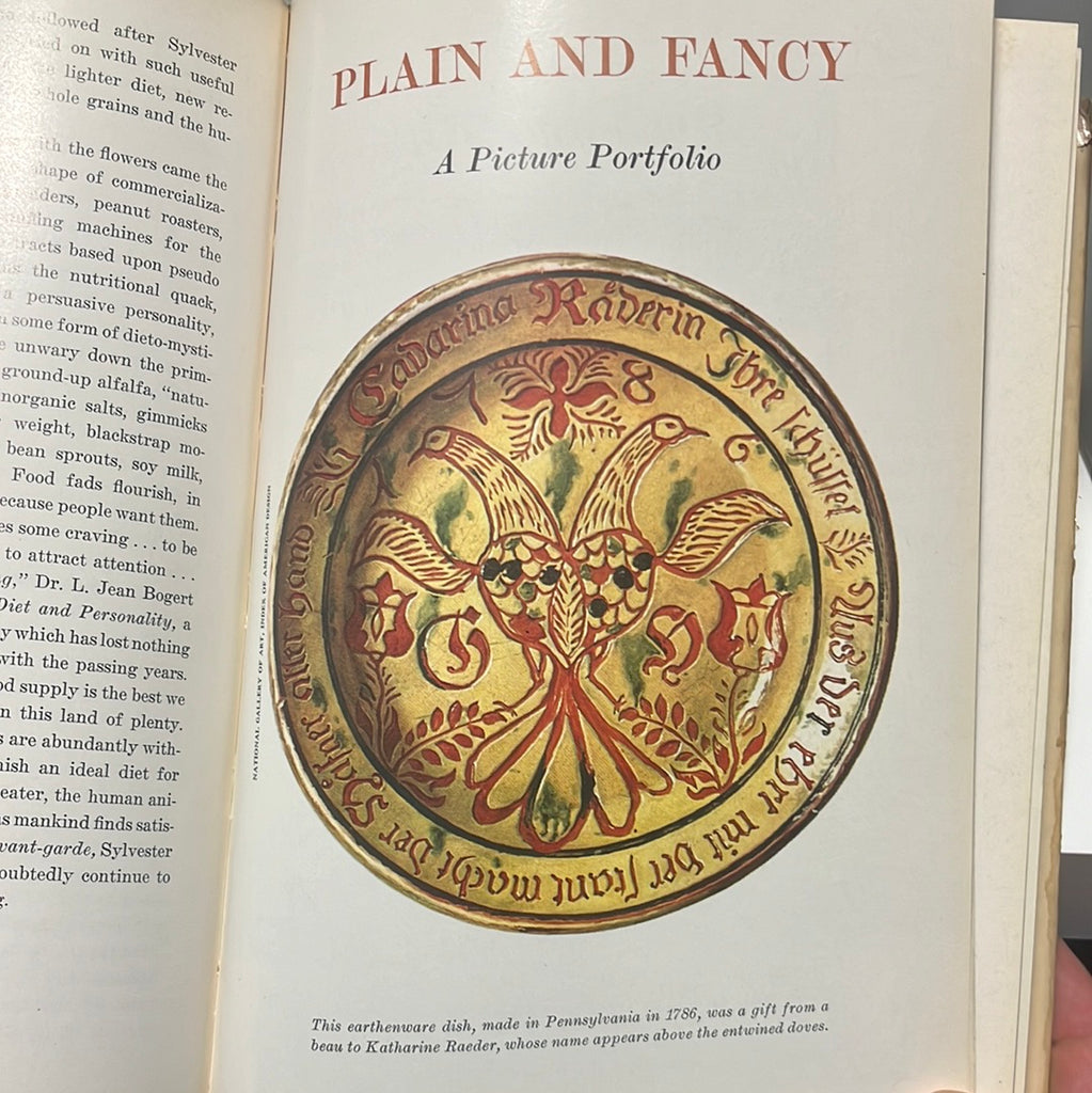 American Heritage Cookbook and history of American eating & drinking page for the Plain and Fancy section features a photograph of an earthenware dish made in colonial-era Pennsylvania. From Spoons Kitchen Exchange. 