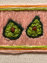 “Avocado Slice” (2026) - embroidery on canvas - Vibrantly Earthy