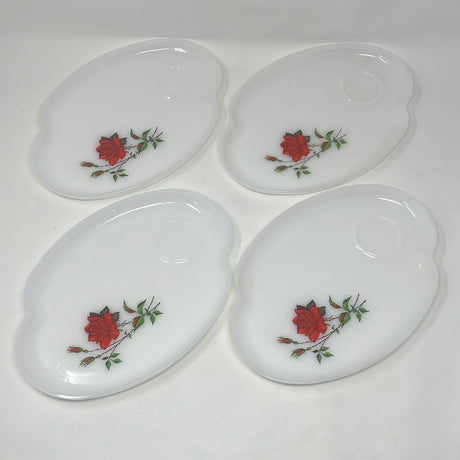 White milk glass snack set featuring red rose designs. Includes 4 teacups and saucers by Federal Glass Co. Excellent condition.