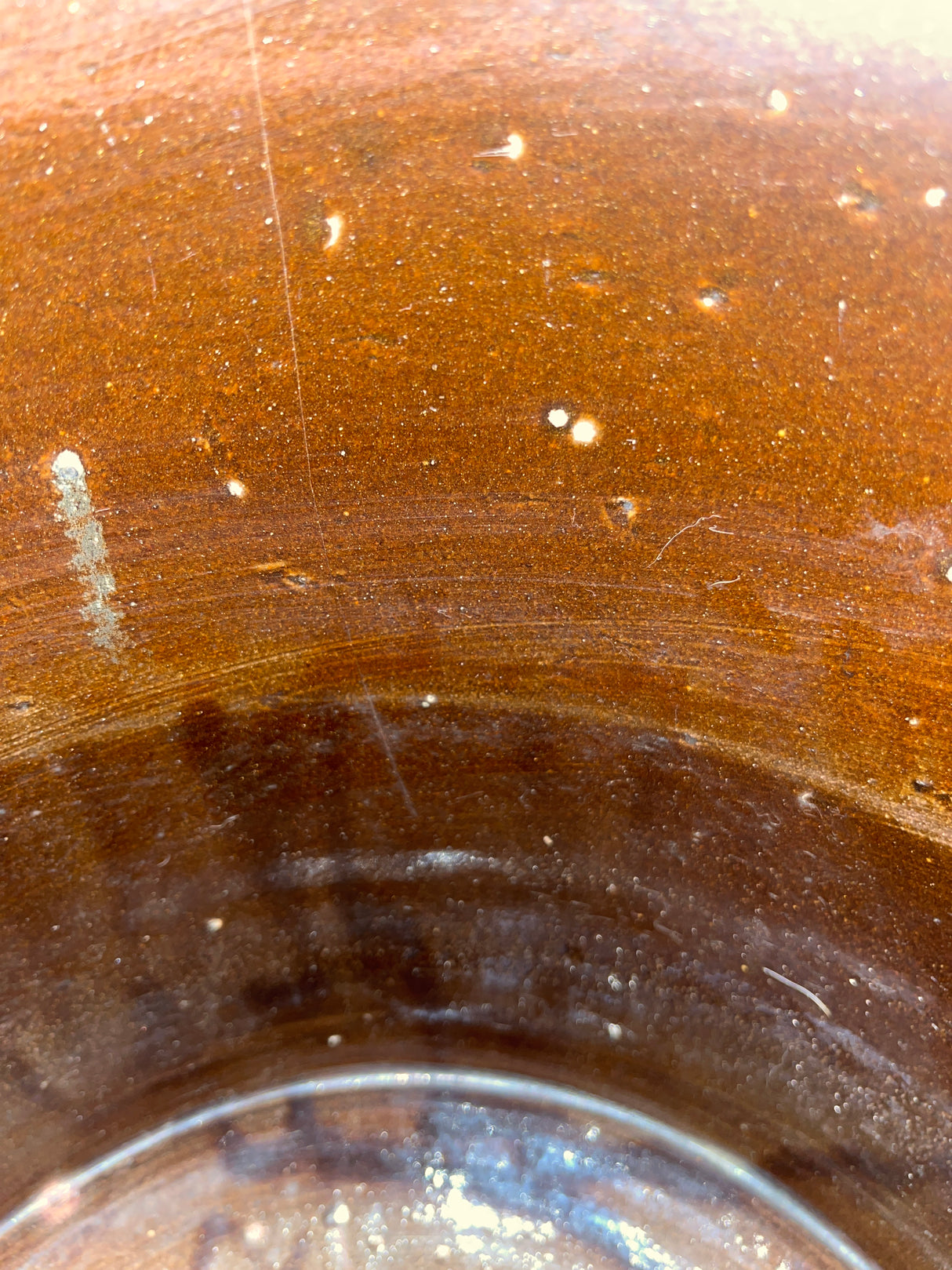 Antique 5 gallon stoneware ceramic pickling crock with a blue 5 stamp, featuring minor interior glaze pock-marks; otherwise in excellent condition.