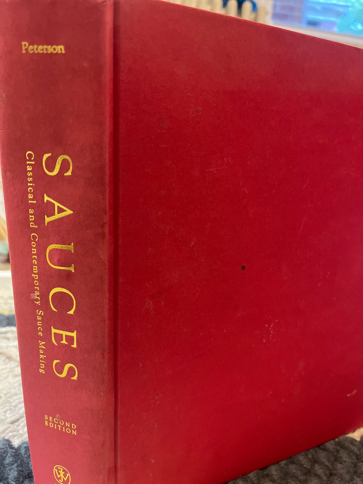 "Sauces: Classical and Contemporary Sauce Making" by James Peterson (1998)