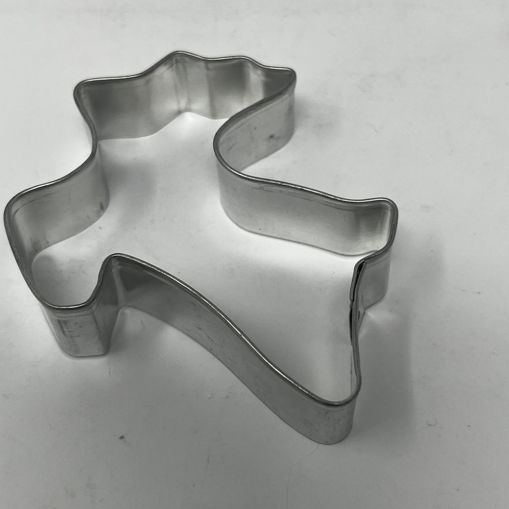 Mid century metal cookie cutters in various shapes including ghost, dog, and more.