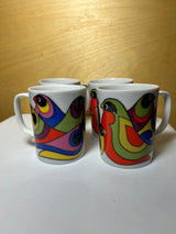Set of four FF groovy mugs featuring a vibrant bird pattern, showcasing unique designs and artistic flair, perfect for adding charm to any kitchen collection.