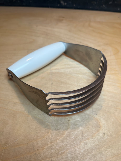 Pastry blender with stainless steel blades and white handle - Betty Crocker, designed for cutting cold butter into flour for pastries and pies.