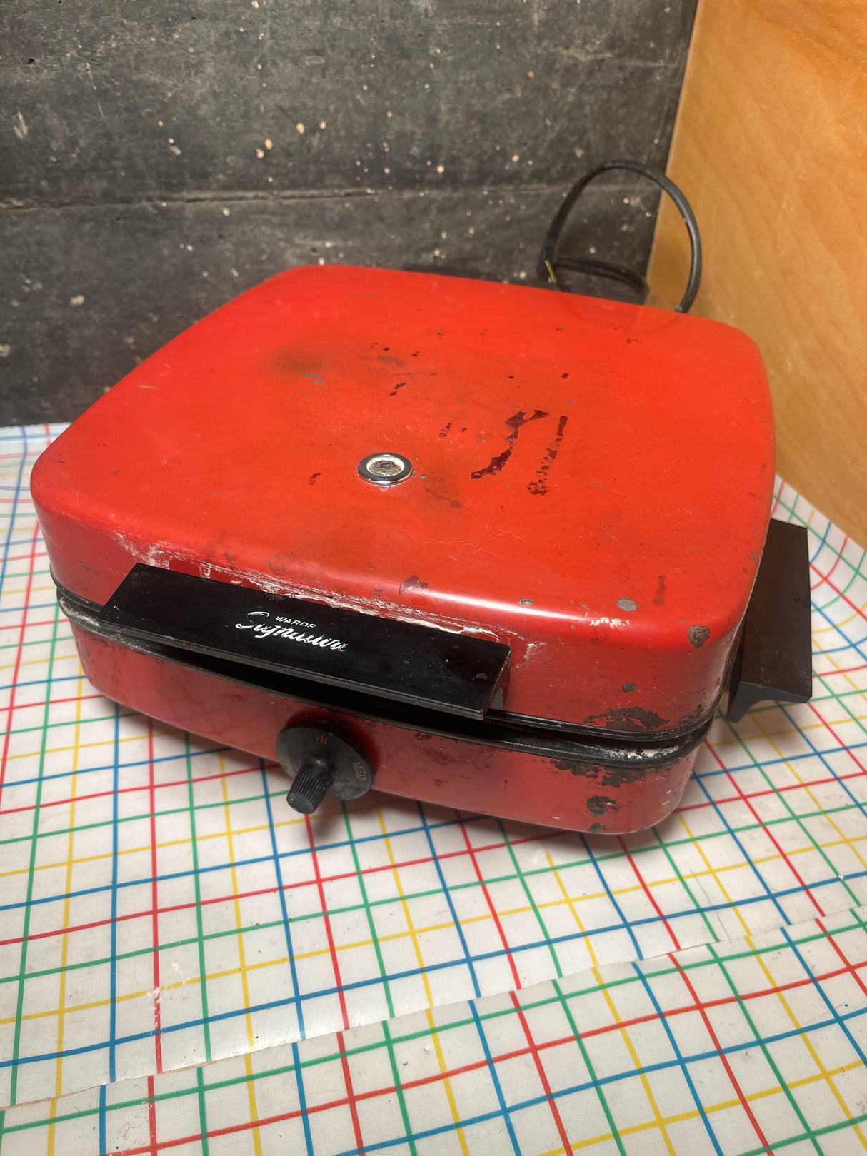 Waffle iron - red vintage Wards Signature BE-46029, featuring a clamshell design with a temperature knob, latch handle, and power cord for versatile cooking.