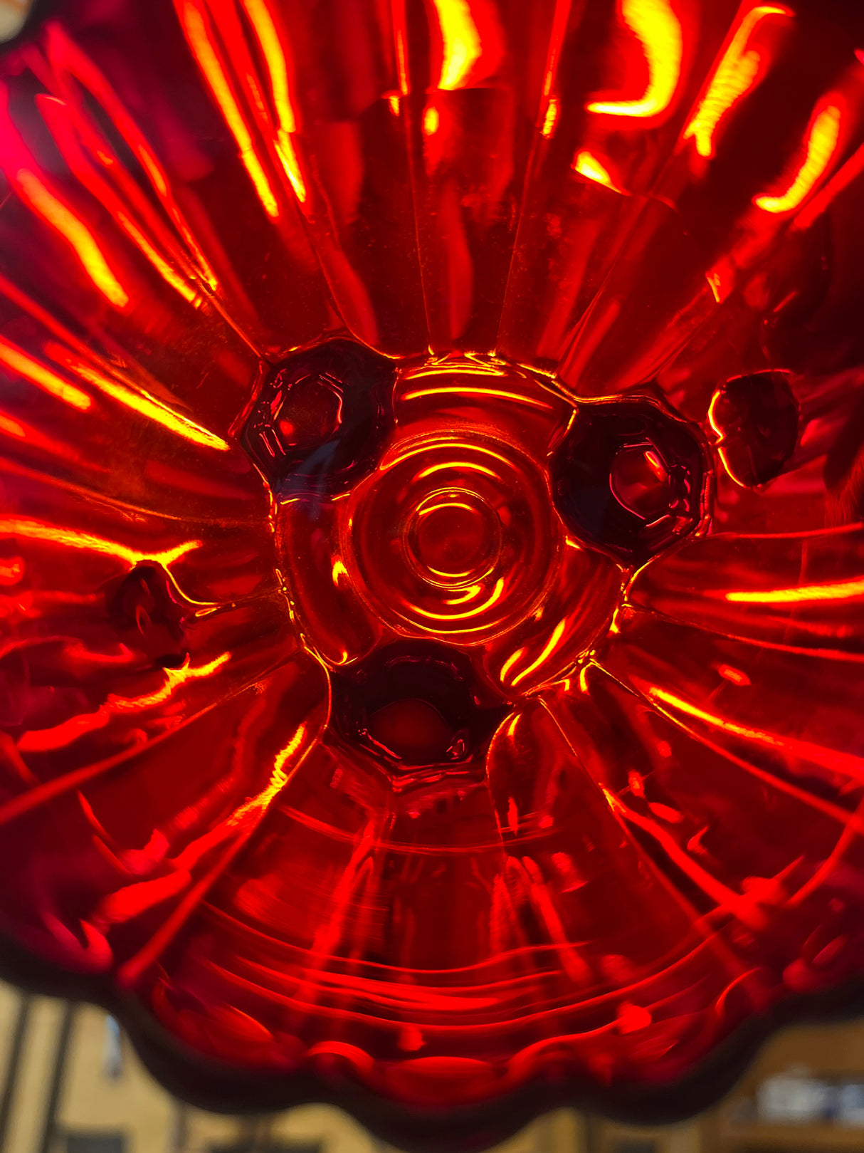 Imperial Glass Co. ruby red creamer and sugar bowl set showcasing intricate details, with each piece in excellent condition from the 1950s, beautifully catching the light.