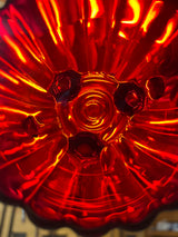 Imperial Glass Co. ruby red creamer and sugar bowl set showcasing intricate details, with each piece in excellent condition from the 1950s, beautifully catching the light.