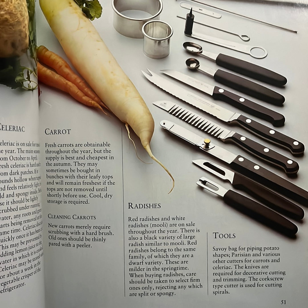 Garnishing and Decoration book featuring kitchen tools and carrots, showcasing techniques for visually appealing food presentation by chef Rudolf Biller.