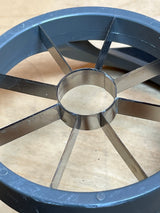 Pineapple corer - Hamilton Beach with a round plastic frame and stainless steel blades, featuring grippy silicone and plastic handles for easy coring and slicing.