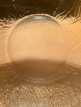 Close-up of Viking 2408 cabbage 12 glass serving bowl, showcasing its textured, amber-like surface with embossed cabbage design, capturing light beautifully.