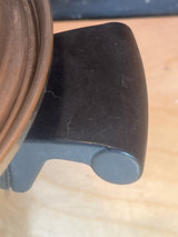 Stock pot with lid and black handles - vintage Duncan Hines 3-ply 18-8 stainless steel, shown with a Mason jar lid ring and jar opener tool.