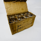 Yugoslavian sherry glasses set of 8 with delicate glass walls, original box like a beat-up treasure chest. From Spoons Kitchen Exchange.