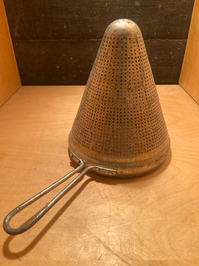 Cone sieve strainer - stainless steel vintage, featuring a cone-shaped design ideal for straining stocks and sauces, heavier than aluminum models, perfect for canning and preserving.