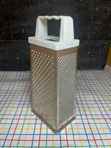 Box grater - stainless steel with white plastic handle