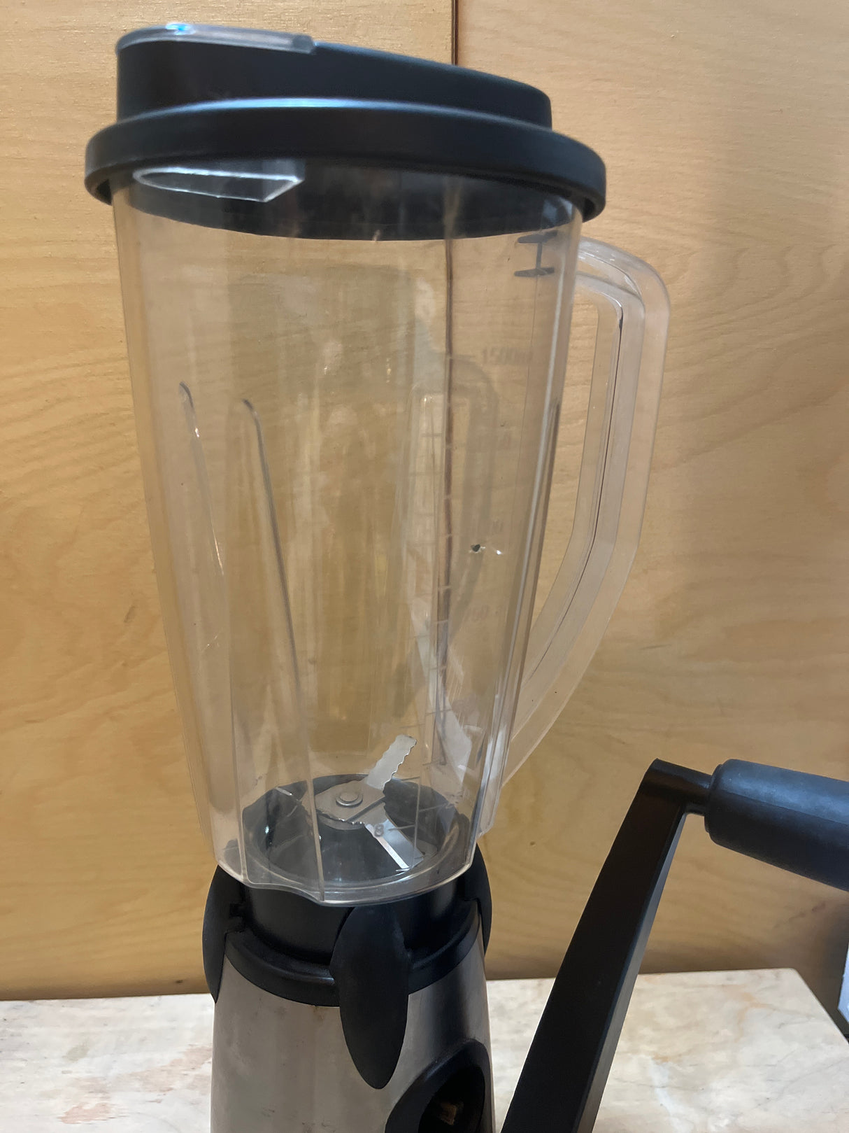 GSI Outdoors Vortex hand-cranked blender with a clear shatterproof Lexan jug, two-speed gear system on a sturdy base, and a vice clamp for stability.