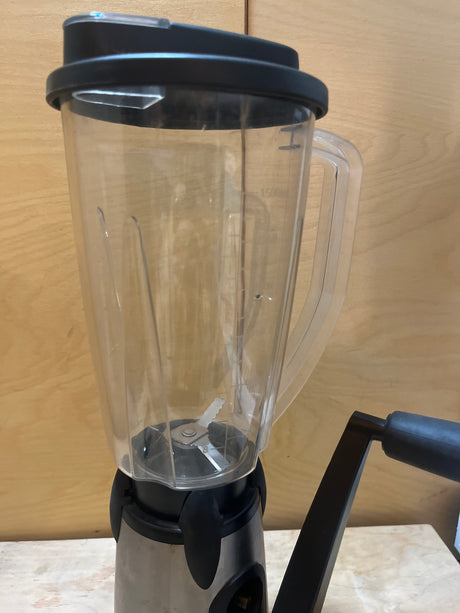 GSI Outdoors Vortex hand-cranked blender with a clear shatterproof Lexan jug, two-speed gear system on a sturdy base, and a vice clamp for stability.
