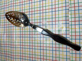 Slotted spoon - stainless steel with dark brown marbled resin handle - Cutco